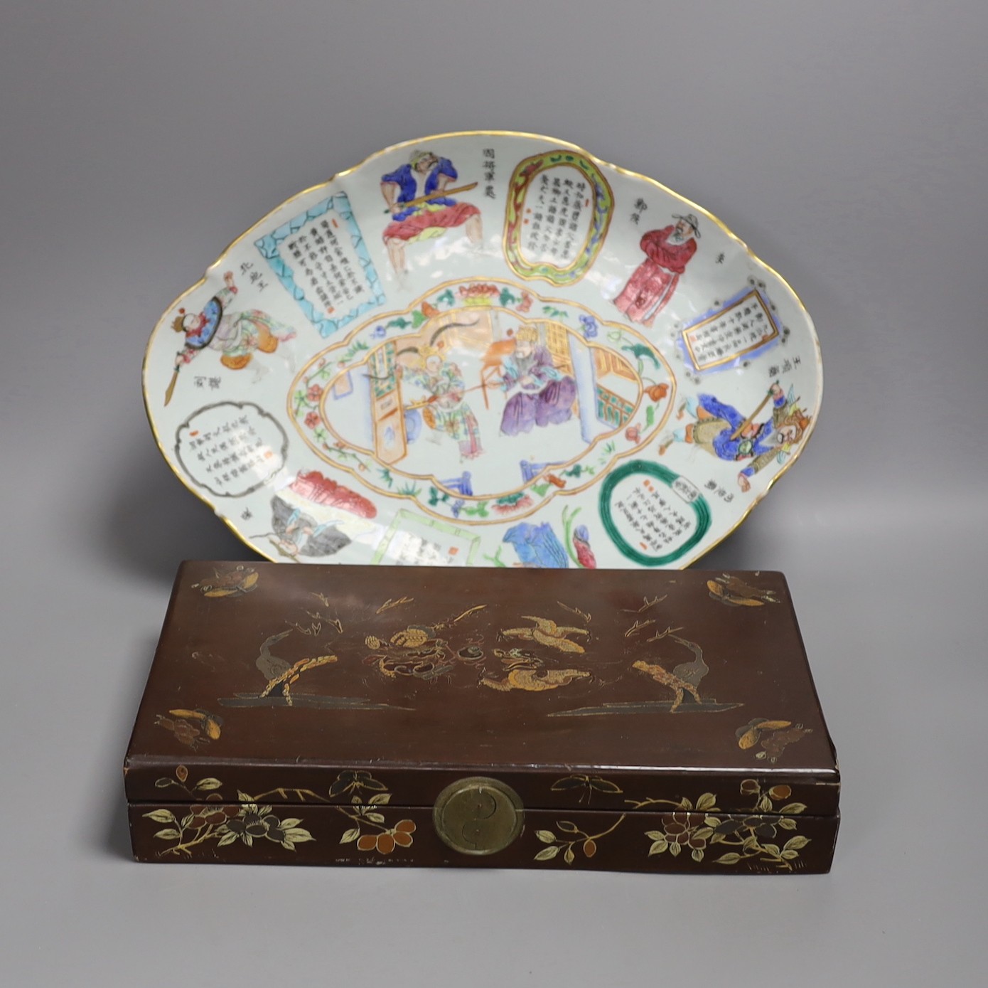 A Chinese Canton oval footed dish, 36cm wide, and a Japanese box with floral decoration and intertwining scroll hinge